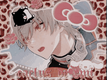 a picture of a boy with a hello kitty bow on his hat