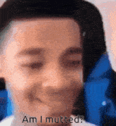 a close up of a person 's face with the words am i muted on it