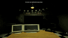 a computer monitor is sitting on a table with the words food in server 500/500 below it