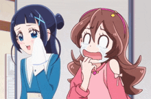 two anime girls are standing next to each other one is crying and the other is surprised