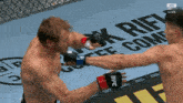 two men are fighting in front of a sign that says coffee comp