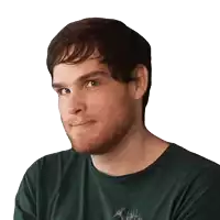 a man with a beard is wearing a green shirt with a picture of a deer on it