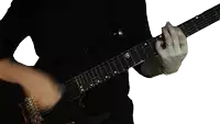 a man playing an electric guitar with a r on the neck
