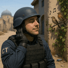 a man wearing a helmet with the letter ct on his sleeve