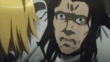 a man with long black hair is making a funny face with his mouth open