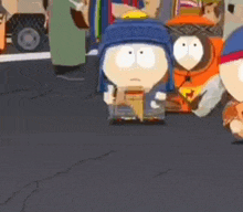 a group of south park characters are standing on a street .