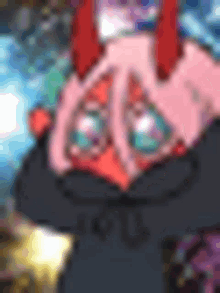 a close up of a cartoon character with red horns and a black hat .
