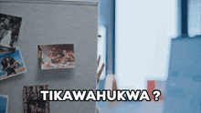 a refrigerator door with pictures on it and the words tikawahikwa written on it