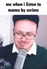 a man with glasses and a hat is talking into a microphone