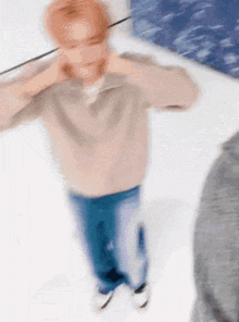 a blurry picture of a person standing on a snowy surface