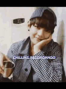 a picture of a person with the words chilling recordando on the bottom right