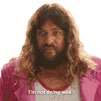 a man with long hair and a beard has the words i 'm not doing well on his shirt