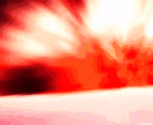 a red and white background with a few spots of light