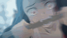 a blurry picture of a person holding something in their hand