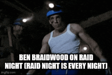 a man wearing a white tank top and a blue headlamp is on a raid night .