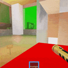 a flashlight is sitting on a red table in a video game