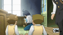 a group of cartoon characters are sitting on the floor with cn written on the bottom
