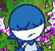 a blue and white cartoon character is standing in a field of pink flowers .
