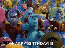 a bunch of monsters from monsters inc are dancing in a room and saying happy birthday .
