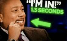 a man in a suit and tie says " i 'm in " in 1.3 seconds