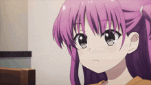 a girl with purple hair is looking at something