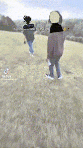 two people are walking in a field with the words hightop dreads must go on the bottom