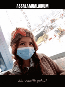 a woman wearing a face mask and a knitted hat says assalamualaikum