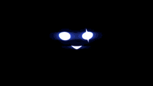 a glowing blue face with sharp teeth and glowing eyes