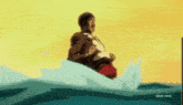 a man is riding a wave on a jet ski in the ocean .