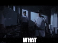 two soldiers are standing in a dark room with the word malfunction written on the screen