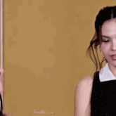 two women hugging each other with the word noodle in the corner