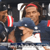 a man wearing a patriots hat says have a good day on the screen