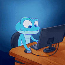 a cartoon of a lizard sitting at a desk using a computer