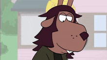 a cartoon character with horns is standing in front of a pink building