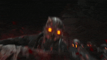 a group of zombies with red eyes and blood on them