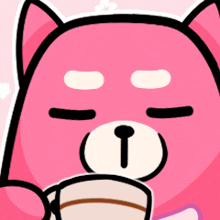 a pink cat is holding a cup of coffee in its paws