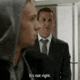 a man in a suit says " it 's not right "