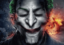 a close up of the face of the joker