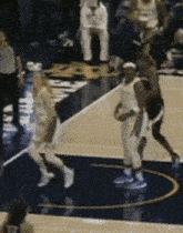 a basketball game is being played on a court that has the word ucsd on the floor