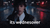a girl with pigtails and the words its wednesover above her
