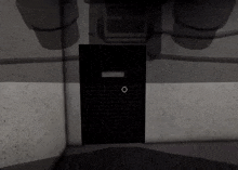 a black and white photo of a door in a room
