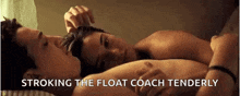 a man and a woman are laying on top of each other in bed .