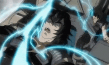 a man is being electrocuted by a lightning bolt while laying on the ground .