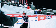 a person wearing a number 15 on their jersey