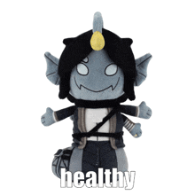 a stuffed toy with the word healthy written on it