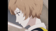 a close up of a girl with short brown hair