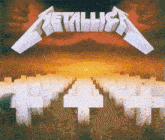 a metallica album cover shows a cemetery with crosses in the grass