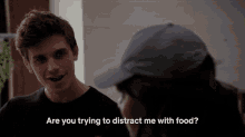Are You Trying To Distract Me With Food It May Be Working GIF - Are You Trying To Distract Me With Food It May Be Working I See What Youre Doing GIFs