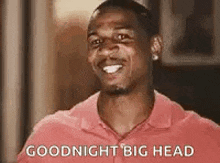 a man is smiling and saying `` goodnight big head '' .