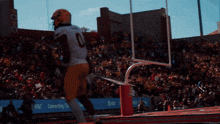 a football player with the number 10 on the back of his uniform